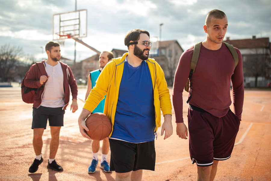 Group of guys playing basketball.