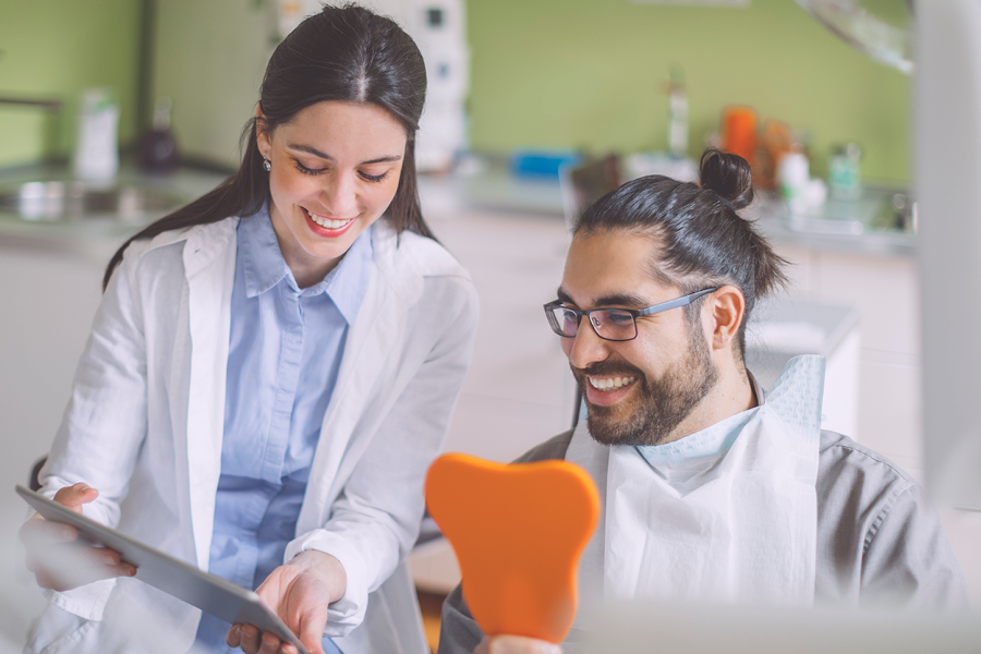Person getting an exam at the dentist.